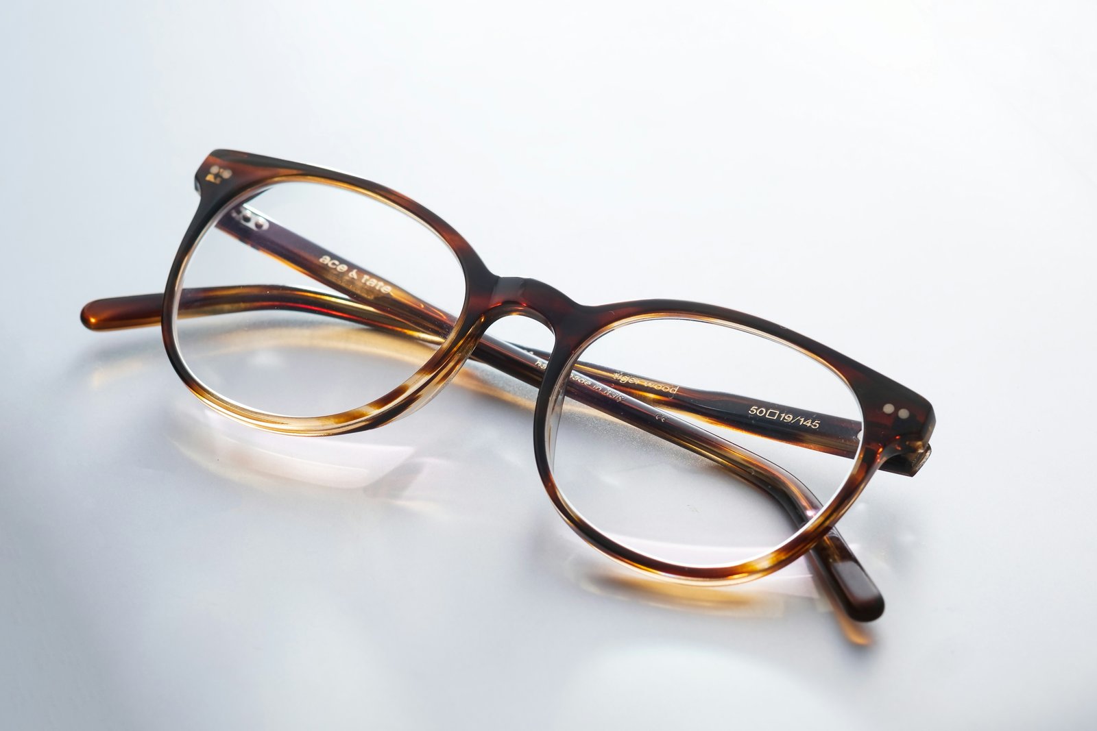 Black and brown eyeglass frames close up